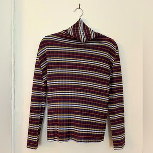 Pleats Please — Striped Turtleneck blouse